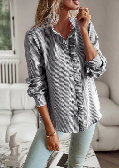 Blouse élégante à volants